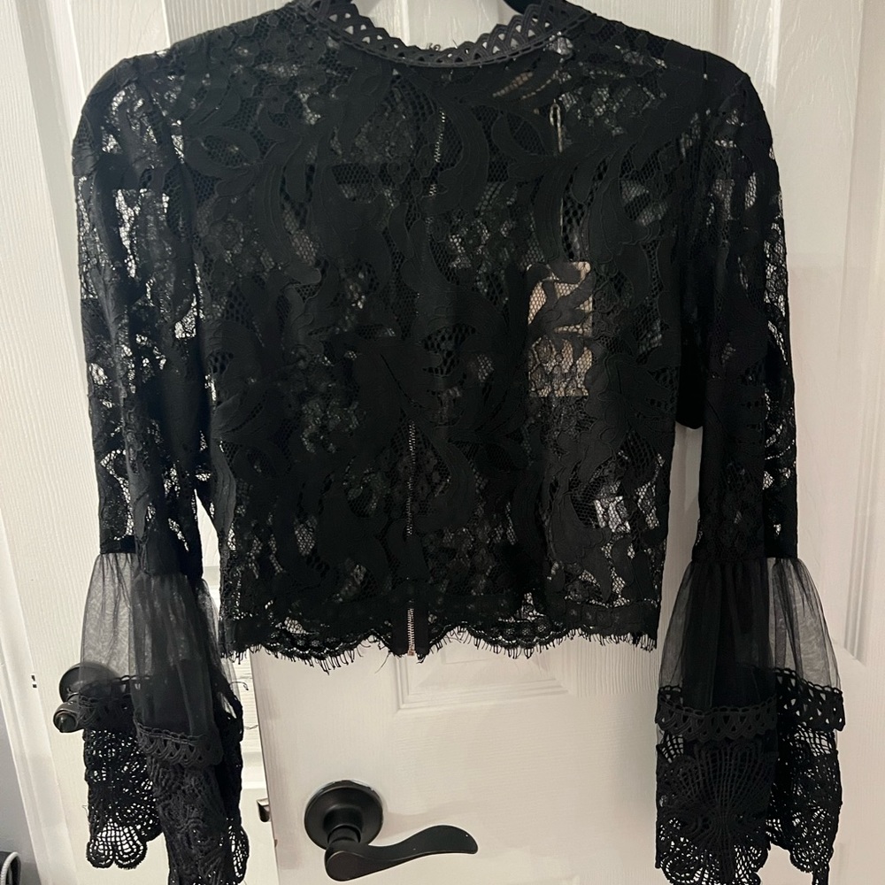 Women’s black lace cropped shirt with a zipper in the back